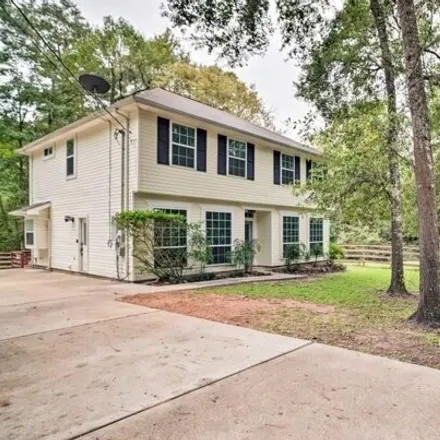 Rent this 4 bed house on 266 Cheyenne Road in Conroe, TX 77316