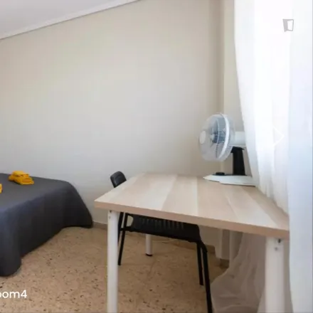 Rent this 4 bed room on Carrer del Mestre Marçal in 46019 Valencia, Spain
