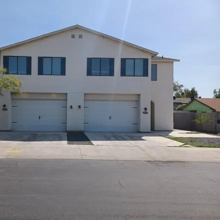 Rent this 4 bed house on 3003 East Paradise Lane in Phoenix, AZ 85032