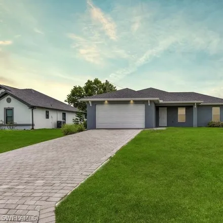 Buy this 3 bed house on 1011 NW 7th Pl in Cape Coral, Florida