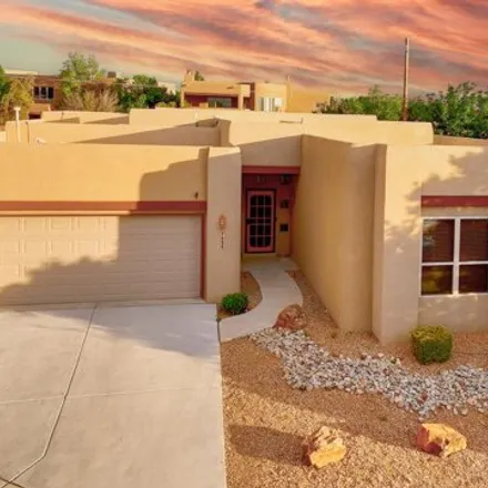 Buy this 4 bed house on 7424 Enchanted Sky Ln NE in Albuquerque, New Mexico