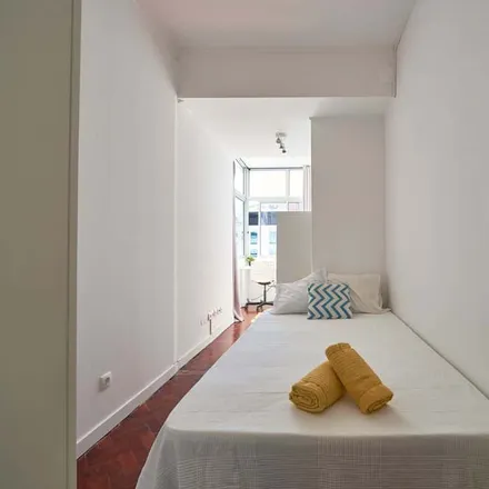 Rent this 1studio room on Avenida Miguel Bombarda in 1051-802 Lisbon, Portugal