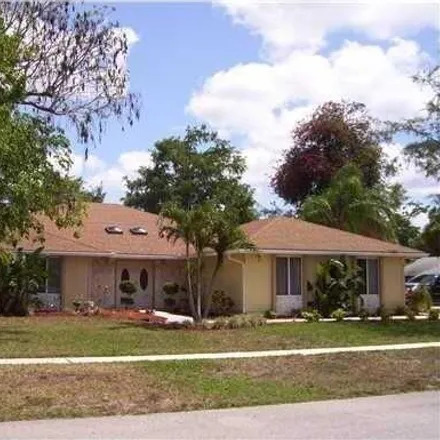 Rent this 4 bed house on 13775 Carlton Street in Wellington, FL 33414