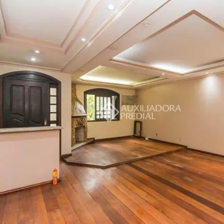 Rent this 4 bed house on Avenida Carneiro da Fontoura in Passo da Areia, Porto Alegre - RS