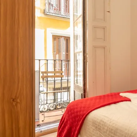 Rent this 4 bed room on Calle de Gerona in 14, 28012 Madrid