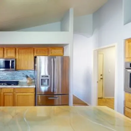 Buy this 4 bed apartment on 4955 Whisper Wind Street Northwest in Northwest Albuquerque, Albuquerque