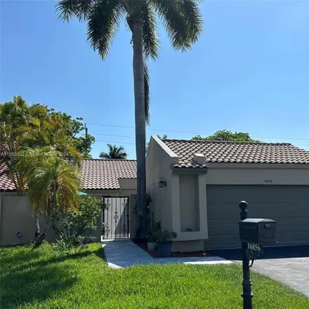 Buy this 3 bed house on 16856 Patio Village Lane in Weston, FL 33326