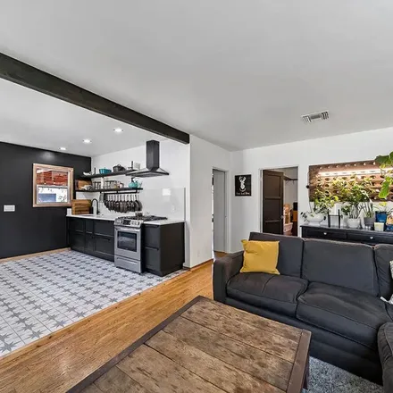 Rent this 3 bed apartment on 11585 Califa Street in Los Angeles, CA 91601