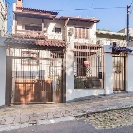 Buy this 3 bed house on Rua Joaquim Cruz in Santo Antônio, Porto Alegre - RS