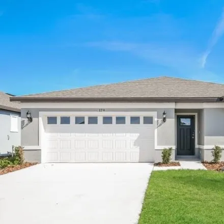 Rent this 4 bed house on 129 Royal Fern Dr in Lake Alfred, Florida