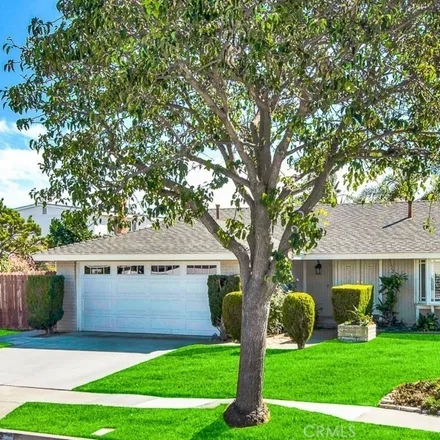 Buy this 4 bed house on 9122 Warfield Drive in Huntington Beach, CA 92646
