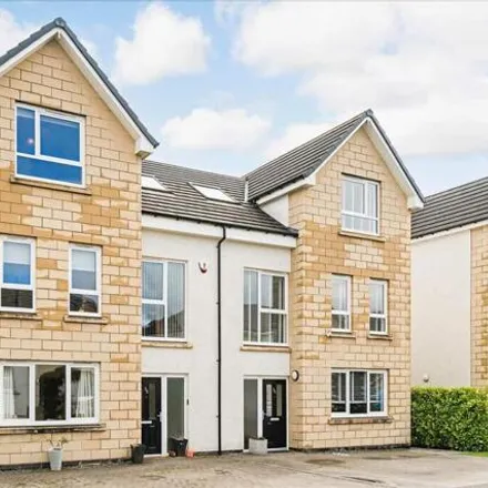 Buy this 4 bed townhouse on Nikka Drive in South Lanarkshire, G75 8FU