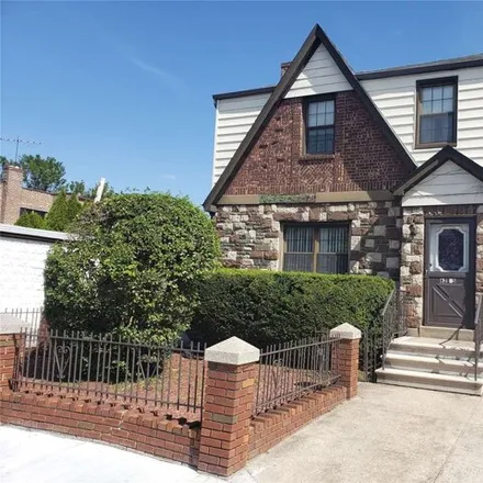 Buy this 3 bed house on 62-15 82nd Place in New York, NY 11379