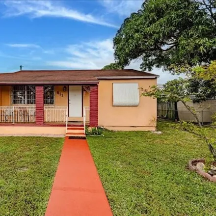 Buy this 2 bed house on 611 E 7th St in Hialeah, Florida