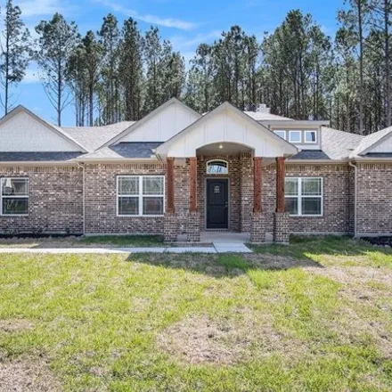 Buy this 4 bed house on 13412 Maverick Trl in Conroe, Texas