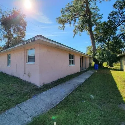 Rent this 2 bed house on 2406 Chestnut Woods Drive in Lakeland, FL 33815