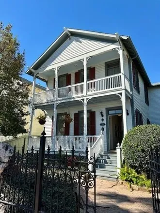 Rent this 3 bed house on 1534 Church Street - Avenue F in Galveston, TX 77550