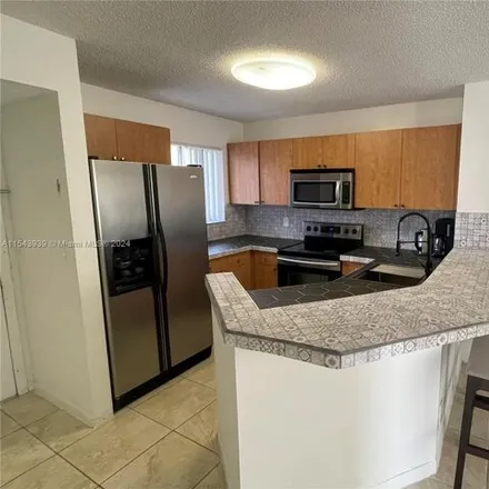 Rent this 2 bed condo on 8554 Sherman Circle North in Miramar, FL 33025