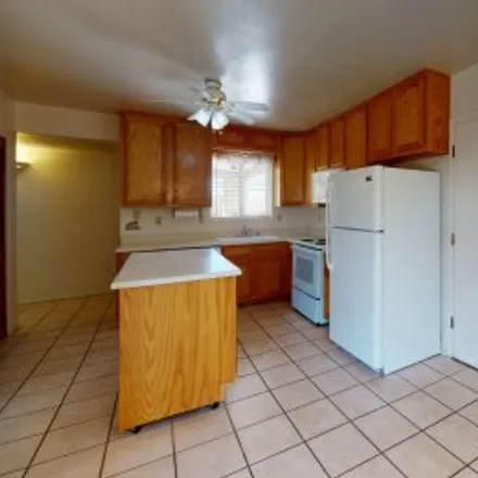 Buy this 3 bed apartment on 5603 Essex Drive Northwest in Paradise Hills Civic, Albuquerque