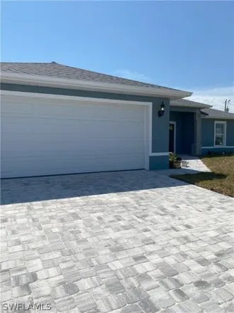 Buy this 4 bed house on 2028 Kismet Parkway West in Cape Coral, FL 33993