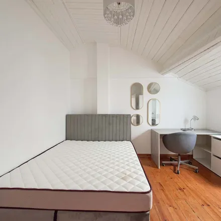 Rent this 13 bed room on Maria Caetano Ceramista in Calçada de Santo André 91, 1100-495 Lisbon