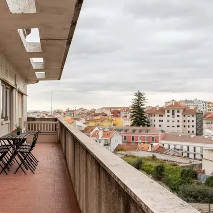 Rent this 3 bed apartment on Rua Borges Graínha in 1170-375 Lisbon, Portugal