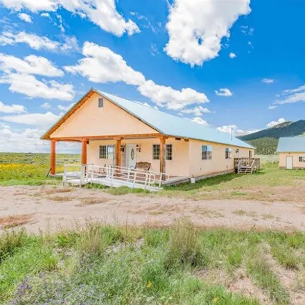 Buy this 3 bed house on 92 Cisneros Road in Taos County, NM 87519