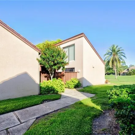 Buy this 2 bed house on 6354 Pelican Creek Crossing in Pinellas County, FL 33707