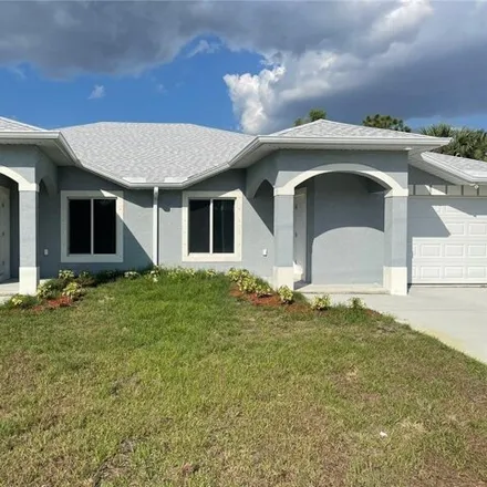 Rent this 3 bed house on 2250 Snead Drive in Lehigh Acres, FL 33973