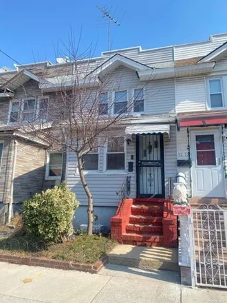 Buy this 3 bed house on 92-21 76th Street in New York, NY 11421