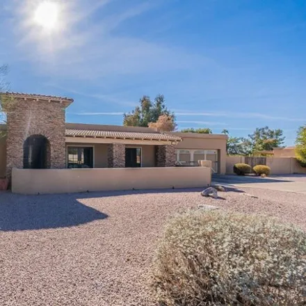 Buy this 4 bed house on 7353 East Sutton Drive in Scottsdale, AZ 85260