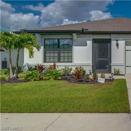 Buy this 4 bed house on Firebush Circle in Bayshore Commons, Lee County