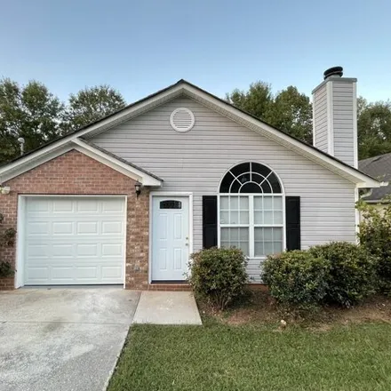 Rent this 3 bed house on 7050 Mahonia Place in Browns Mill Lake, Stonecrest