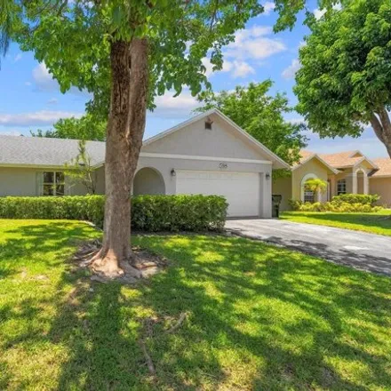 Buy this 3 bed house on 598 NW 45th Way in Delray Beach, Florida