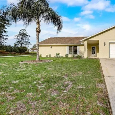 Buy this 3 bed house on 9689 Langan Street in Spring Hill, FL 34606