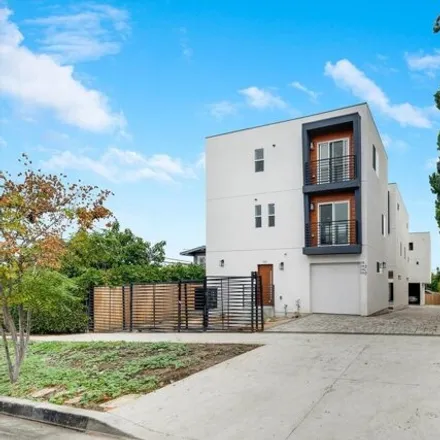 Rent this 3 bed townhouse on 384 North Alexandria Avenue in Los Angeles, CA 90004
