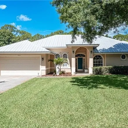Buy this 4 bed house on 2119 SW Danforth Cir in Palm City, Florida