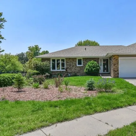 Buy this 4 bed house on 1901 King Arthur Court in Lincoln, NE 68512