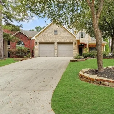 Rent this 4 bed house on Tunica Pass Drive in The Woodlands, TX 77381