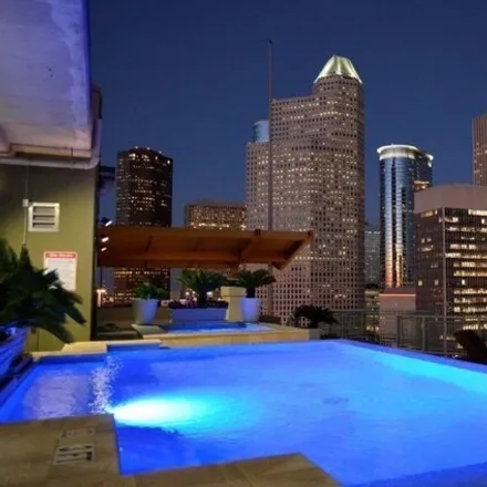 Buy this 2 bed condo on Christian's Tailgate Bar & Grill in 2000 Bagby Street, Houston