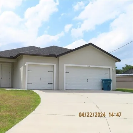 Rent this 3 bed house on Odessa Court in Port La Belle, Hendry County