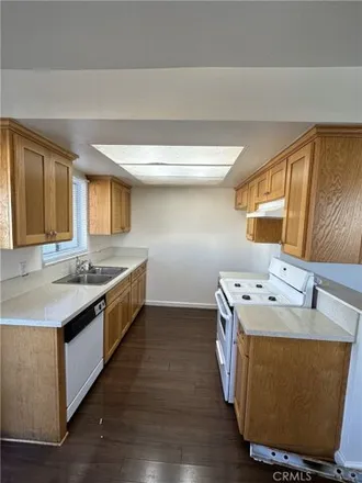 Rent this 2 bed apartment on 1197 Alamo Court in Long Beach, CA 90813
