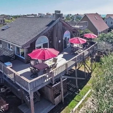 Rent this 4 bed house on 12 Sea Breeze Walk in Fair Harbor, Islip