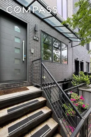 Buy this 4 bed house on 97A Cooper Street in New York, NY 11207