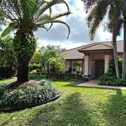 Rent this 4 bed house on 11086 Southwest 1st Street in Coral Springs, FL 33071