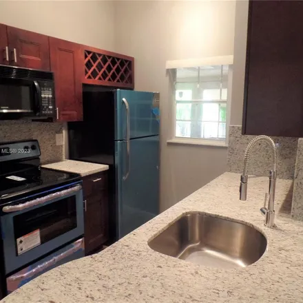 Rent this 2 bed apartment on South Oakland Forest Drive in Broward County, FL 33309