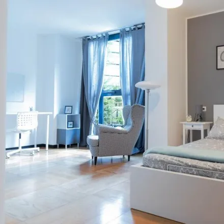 Rent this 12 bed room on Scuola del Corpo di Polizia Locale in Via Sergio Kasman, 20136 Milan MI