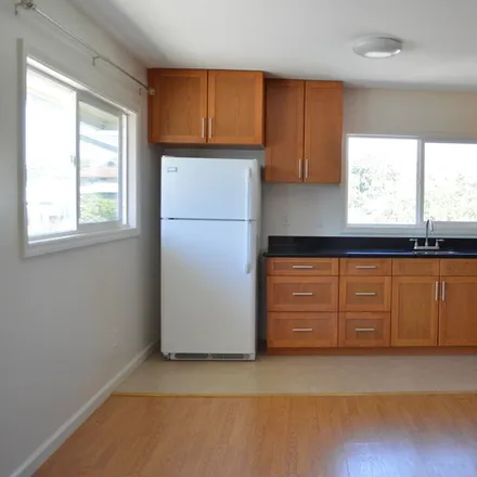 Rent this 2 bed townhouse on 1406 Peter Buck St