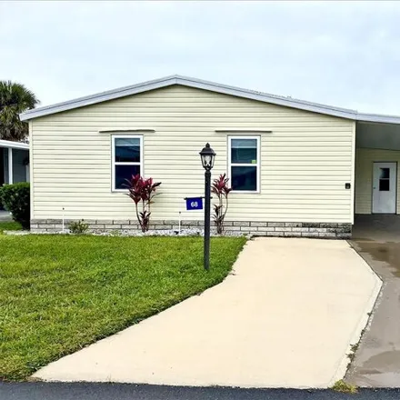Buy this studio apartment on 68 Sea Fern Drive in Lake County, FL 34788