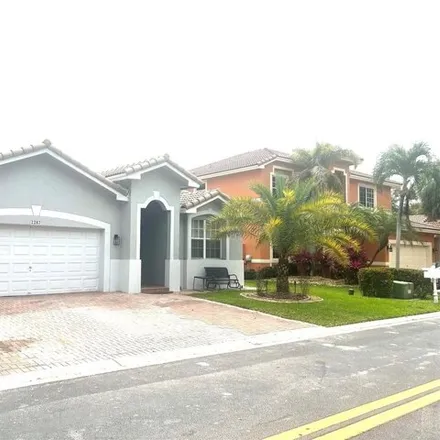 Buy this 4 bed house on 2281 Northwest 72nd Terrace in Pembroke Pines, FL 33024